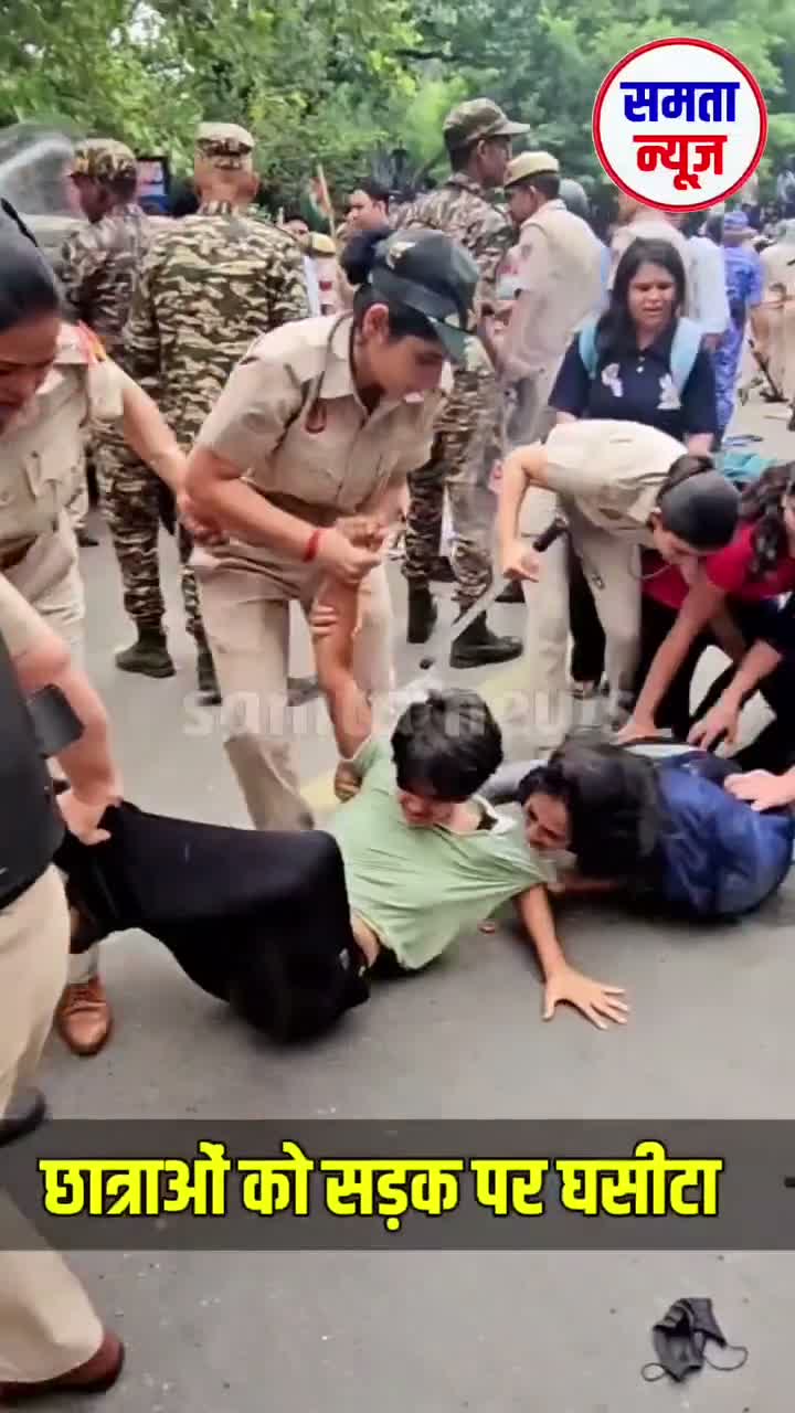 News footage: female students dragged along the road by police