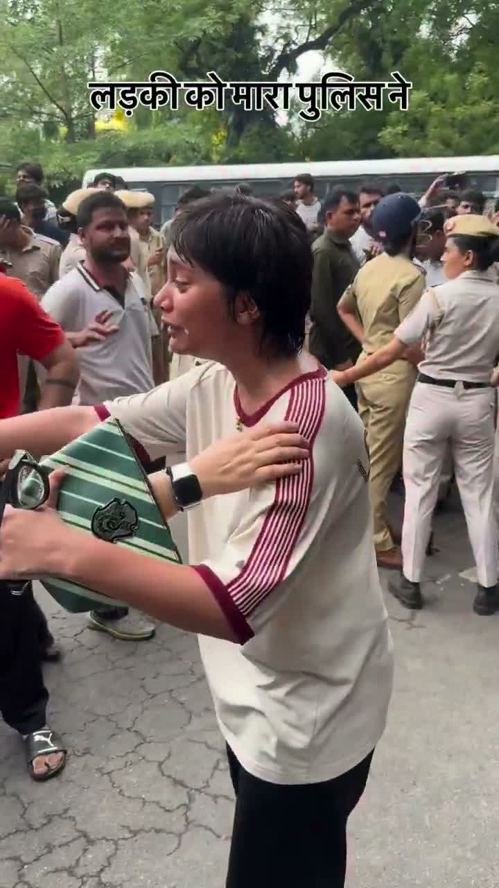 News interview: caption states "police hit the girl"